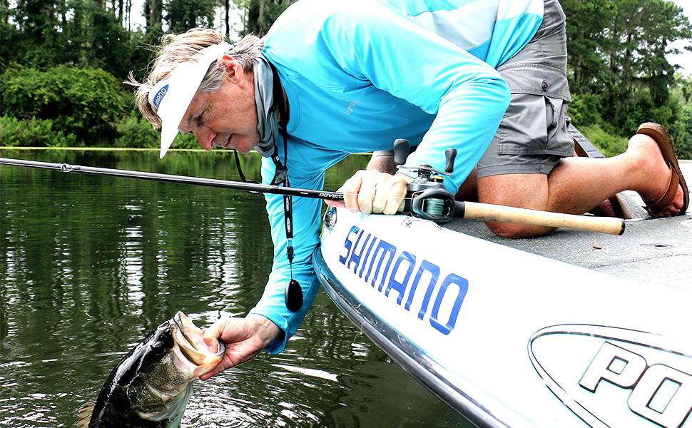 Angler's view of Shimano Curado K 200 baitcasting reel mounted on a fishing rod.