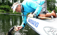 Angler's view of Shimano Curado K 200 baitcasting reel mounted on a fishing rod.